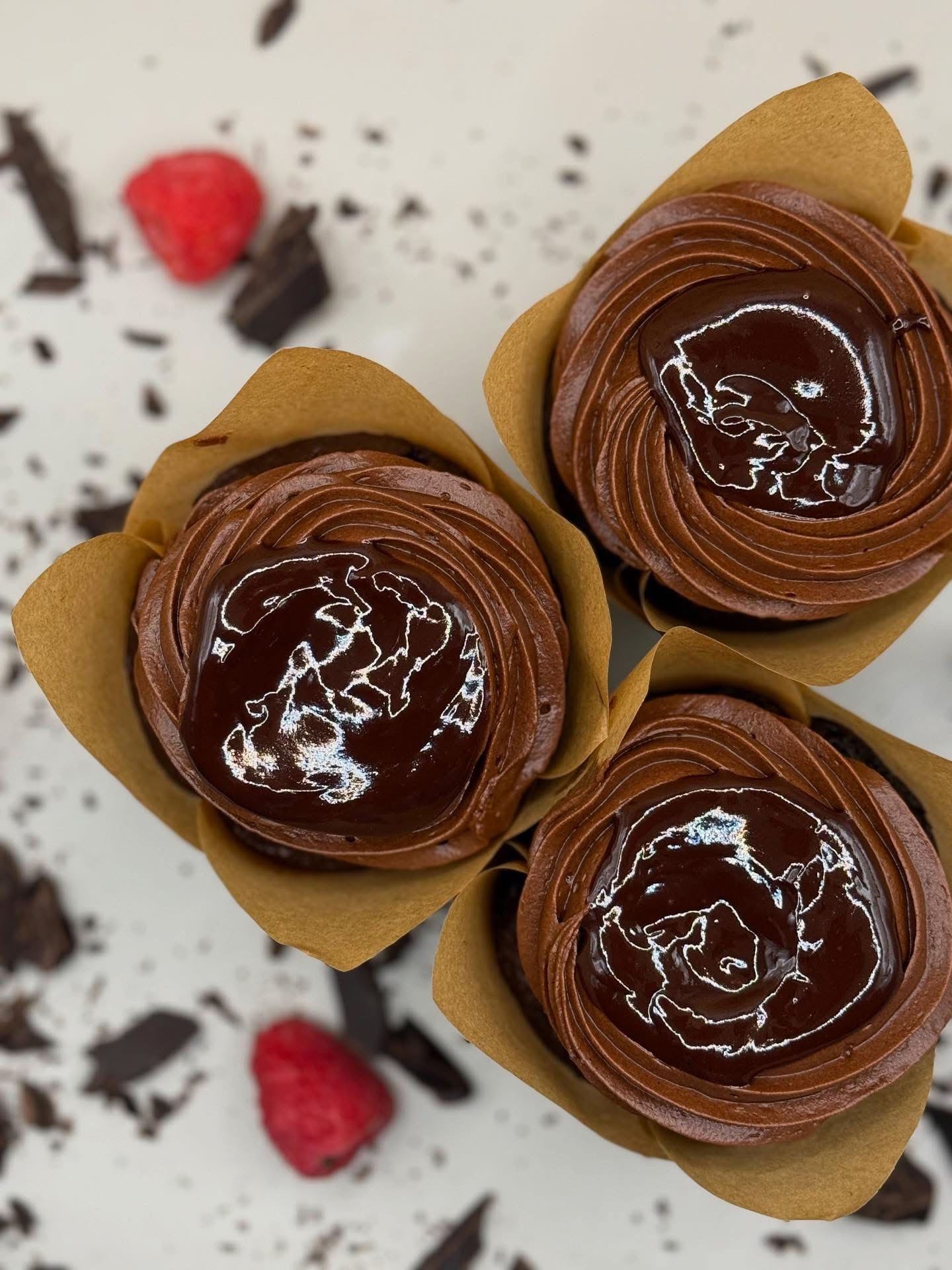 Chocolate frosted cupcakes with ganache swirl